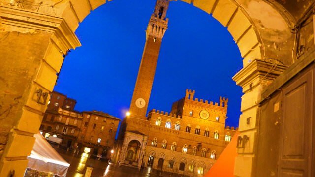 Piazza del Campo in Siena comes to life under the night sky